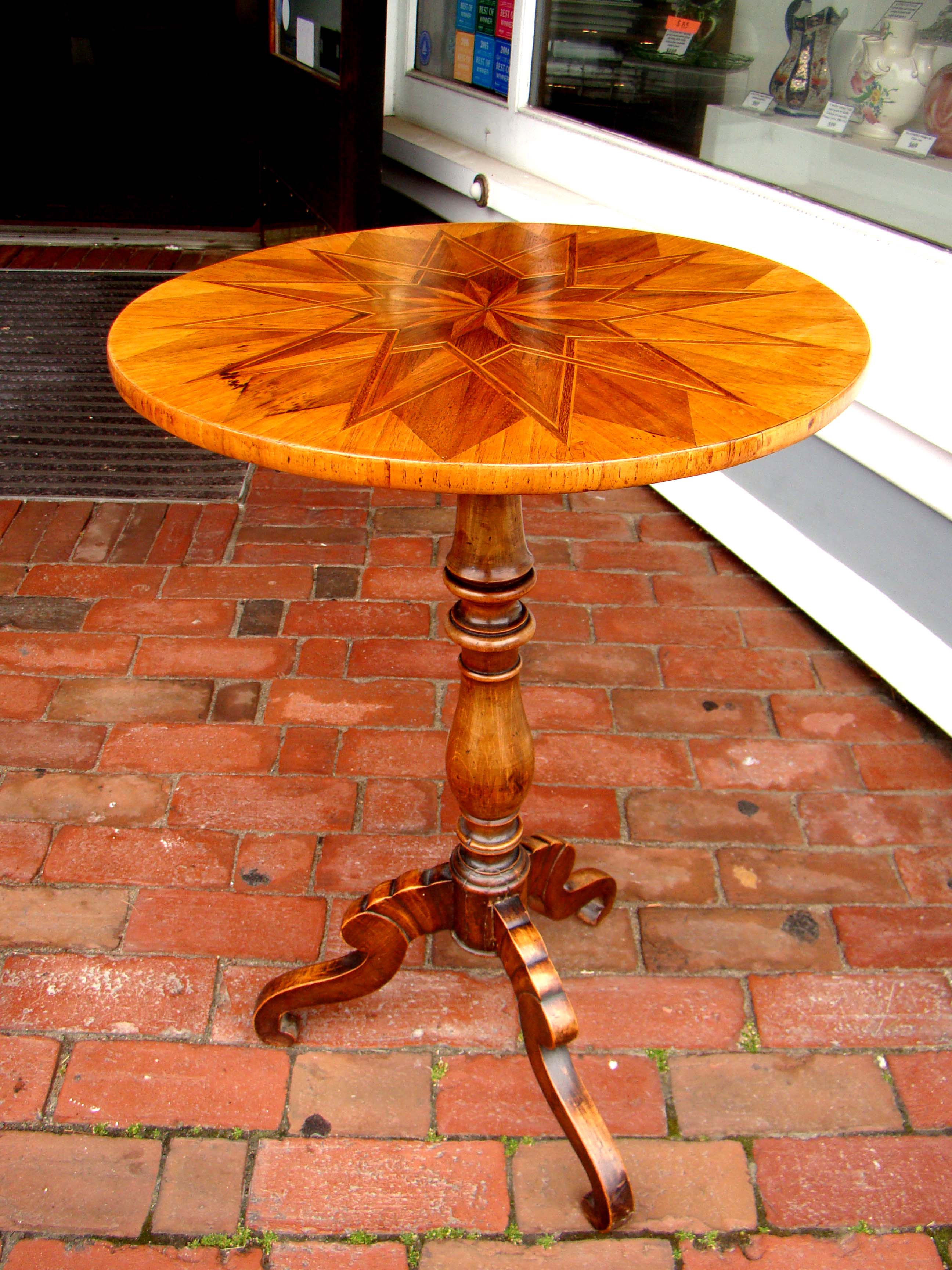 A gorgeous English parquetry fruitwood inlaid walnut  tripod table circa 1830